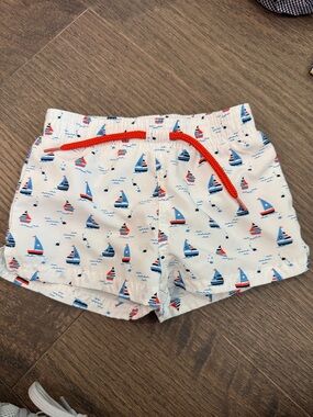 Starting Out White Swim Trunks with Red and Blue Sailboats